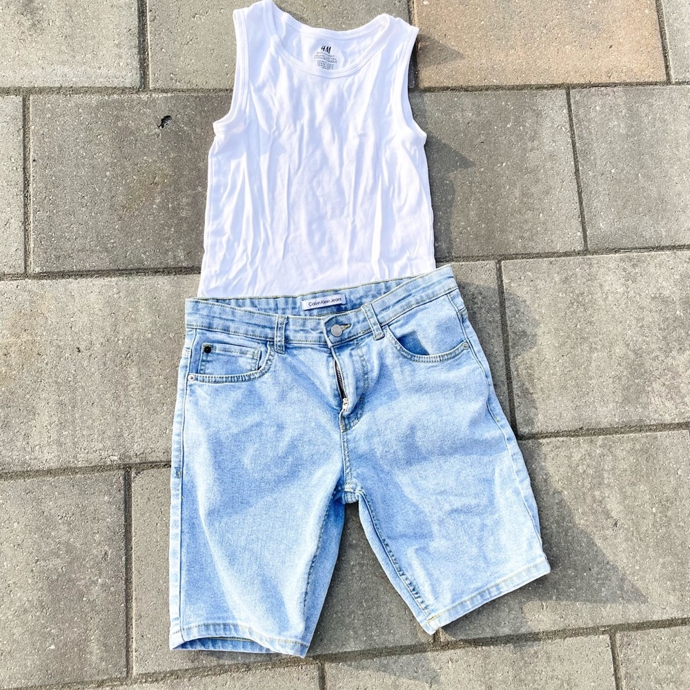 Calvin Kline Jean Shorts and white tank top.